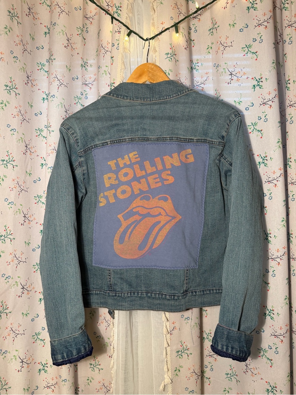 the Rolling Stones Denim Jacket with Red Tongue Patch on Blue